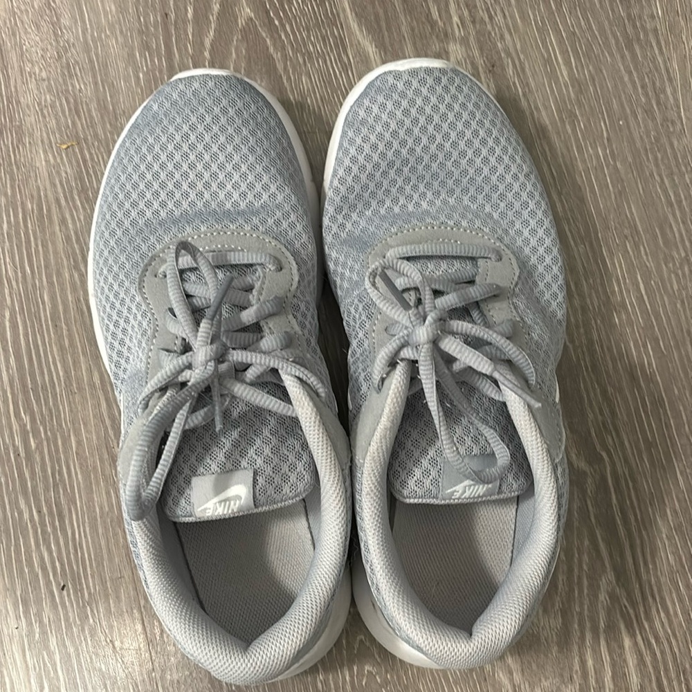Nike, tennis shoes in light blue. Very comfortable